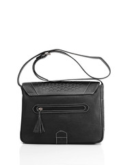 Leather ladies bag on a white background. Beautiful, fashionable, accessory, isolated. Interesting design, the texture of the skin. Comfortable handle.