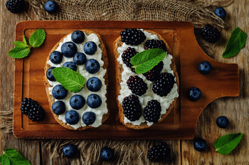 Blueberry and blackberry ricotta rye sandwiches