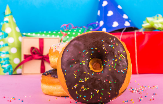 Donuts on a bright background. Birthday