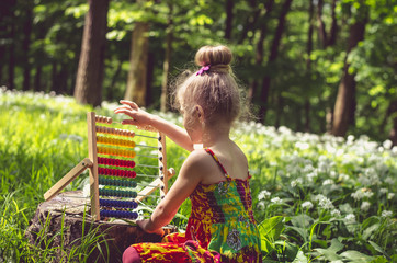 little child learning mathematics