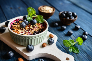 Blueberry crumble with oat flakes and almonds
