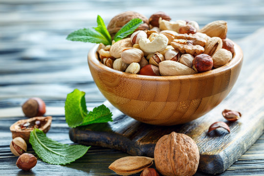 Mix nuts in a bowl closeup.