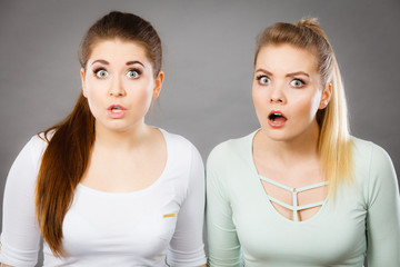 Two shocked and amazed women