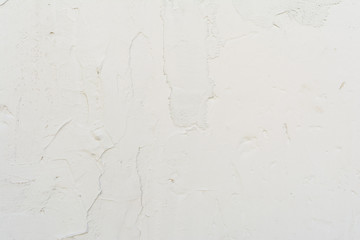 White texture of old painted relief wall