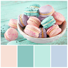 Mint color matching and sweet macarons, closeup