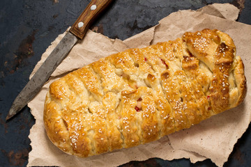 Delicious homemade pie with cheese and surimi