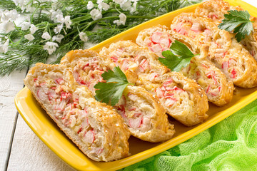 Delicious homemade pie with cheese and surimi