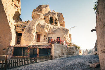 Cave houses Goreme village with in Cappadocia, Turkey - obrazy, fototapety, plakaty