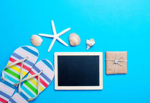 sandals, seashells, gift, blackboard and starfish