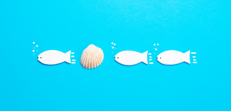 fish shaped toys and seashell