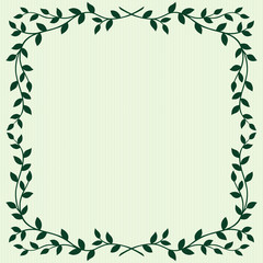 Obraz premium Leaves frame on green background