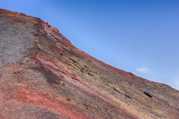 Red rocks slope of Etna - tallest active volcano in Europe. Sicily, Italy