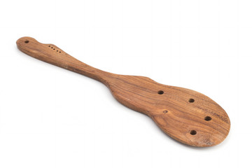 Old wooden spoon on a white background