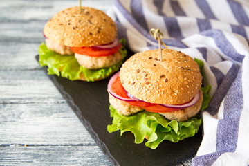 Homemade healthy Turkey Burger with Lettuce and Tomato. selective focus