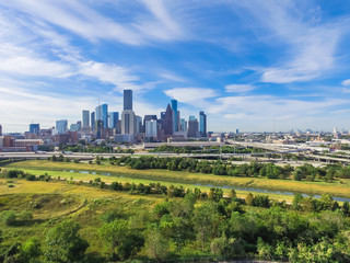 Aerial view Downtown with Interstate 10, 45 and Gulf freeway intersection. Massive highway, stack interchange, viaduct and elevated road junction overpass from Northeast side of Houston, Texas, USA.