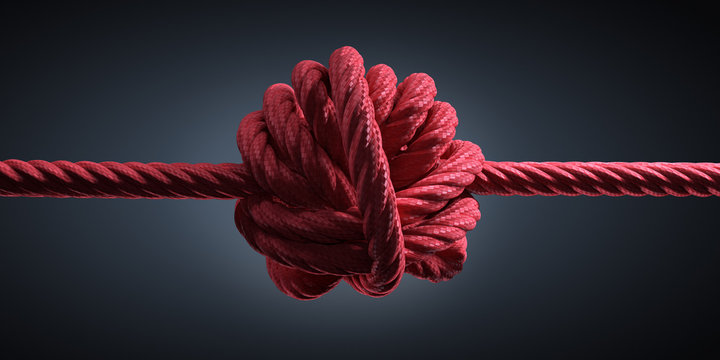 Großer Knoten in rotem Seil