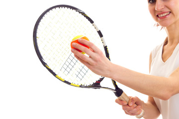 Woman with tennis racquet and ball
