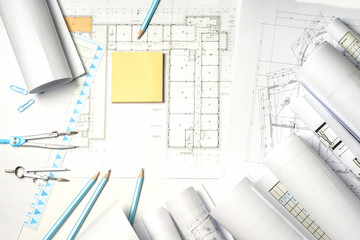 Workplace of architect - rolls and plans.