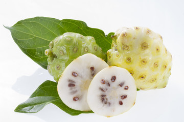 Fototapeta na wymiar Noni fruits isolated on white background - Morinda citrifolia