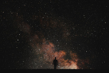 Silhouette of man on a background stars.