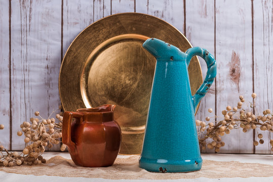Two vases and old plate for vintage background