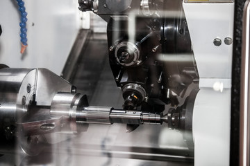 Horizontal CNC milling-turning center with 3-axis double-spindle