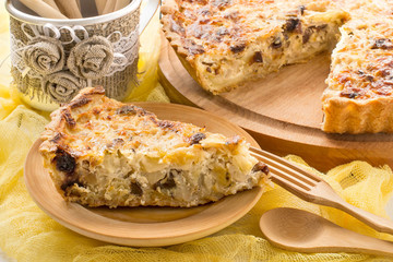 Delicious homemade quiche with cabbage and dried prunes