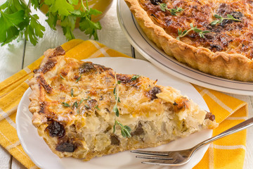 Delicious homemade quiche with cabbage and dried prunes