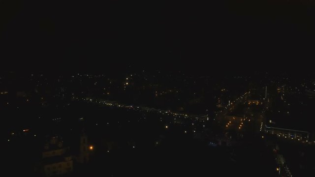 Aerial view Beautiful fireworks video from the drone in the night sky on celebration. Sparks. Fireworks are a class of explosive pyrotechnic devices used for aesthetic and entertainment purposes
