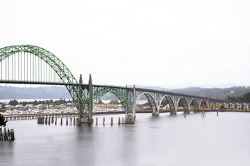Arched Car and pedestrian bridge across bay on Pacifiс coast Newport Oregon