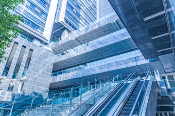 Fototapeta na wymiar modern steps of moving business escalator,modern building