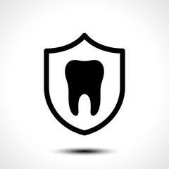 Tooth with protective shield on white background