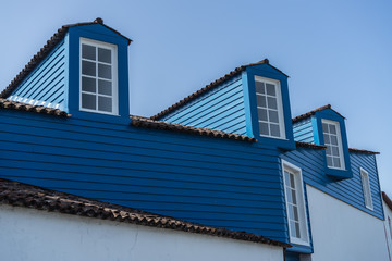 White windows of a nice blue house in a small village, Pico, Azores, Portugal
