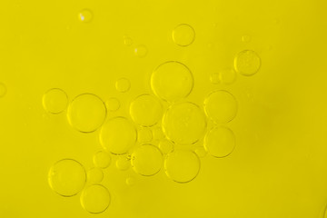 Bubbles of  water in olive-oil, macro.