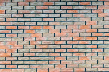 Red grey and brown ceramic brick wall background.