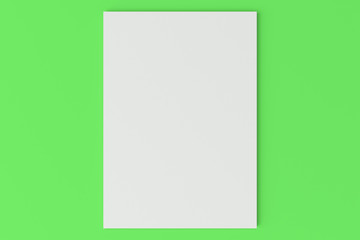 Blank white closed brochure mock-up on green background