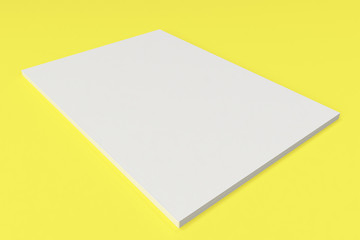 Blank white closed brochure mock-up on yellow background