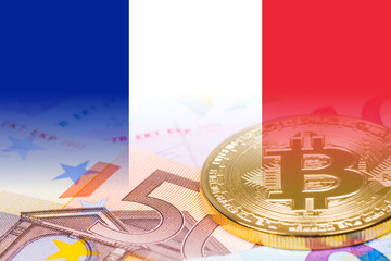 golden bitcoin metallic coin over euro banknotes with france flag