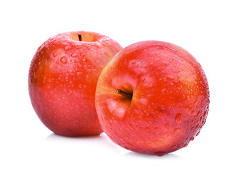 fresh red apples with water drops isolated on white background