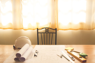Architect desk ,Business,engineering concept, architecture concept, soft focus, vintage tone, working with blueprints in the office