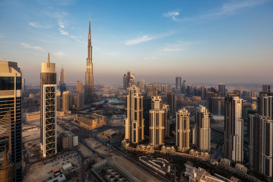 Modern architecture of a big city. Skyscrapers of downtown Dubai, United Arab Emirates. Spectacular daytime skyline. Travel and architecture background.