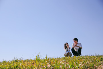 japanese young couple outdoor green