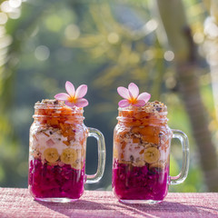Muesli made from papaya, avocado, dragon fruit, banana and dressed with yoghurt, Indonesia