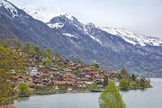 View to the village Brienz, the lake and the snow covered mountains