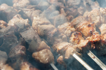 The pork shish kebabs prepared on a brazier
