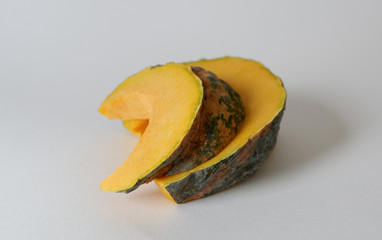 sliced Thai yellow pumpkin isolated with white background