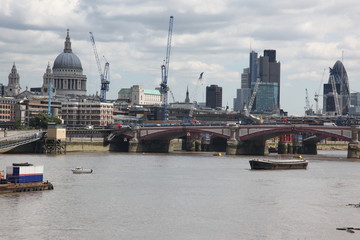 Naklejka premium St. Paul's Cathedral, City and Thames river in London