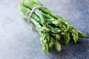 Food background. Healthy vegan concept. Asparagus on table. Green vegetable