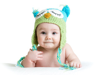 baby in funny owl knitted hat owl on white background