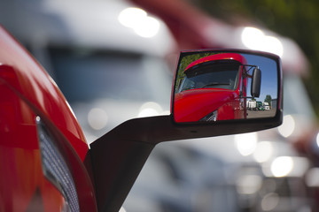 Reflection of the red truck in modern style mirror